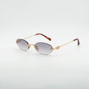 Miu Miu MUA54S 5AK04O Sunglasses Gold Oval Frame, Clear Gradient Grey Lenses